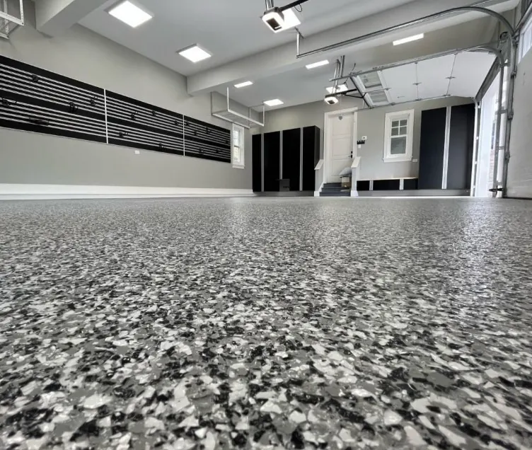 Finished decorative garage floor after the oil stains before coating condition has been assessed and the compatible system installed